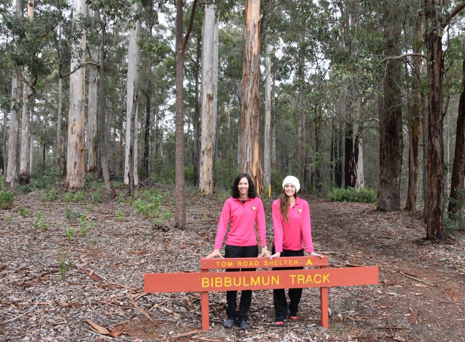Running to raise funds for cancer research: Sarah Wiese and Gemma Reid have a rest day at Donnelly River during the month long run. Photo: Lee Steinbacher