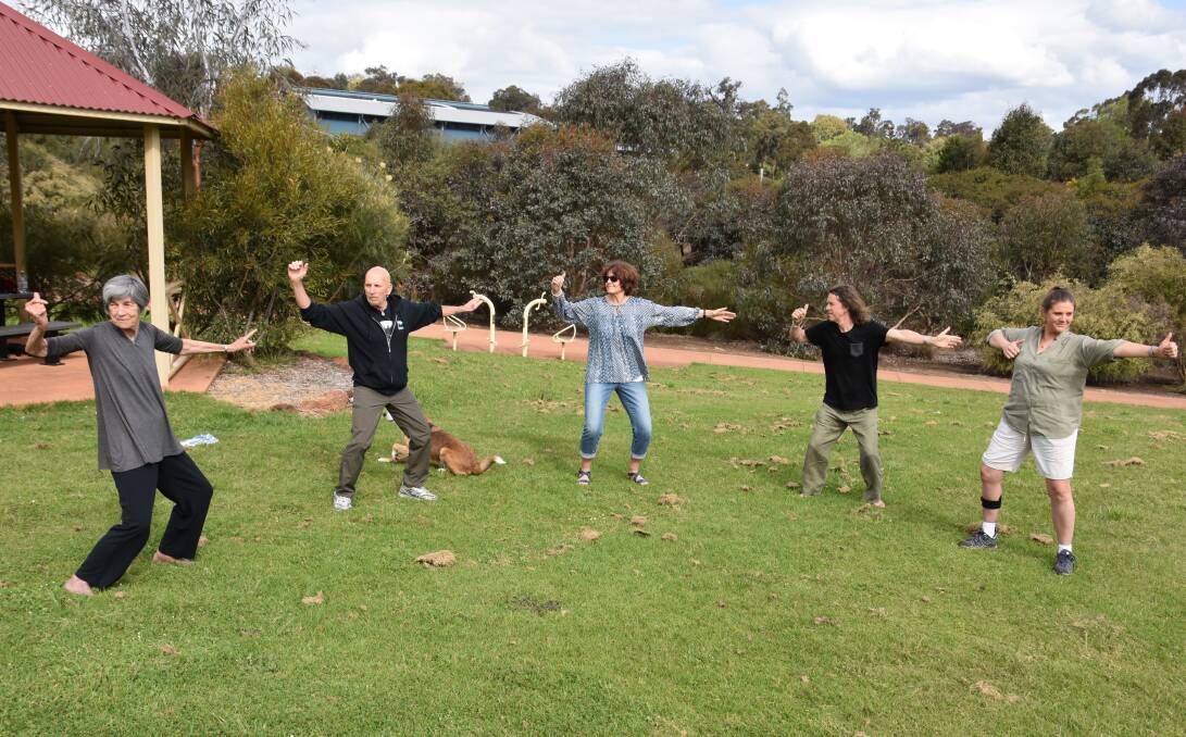 Qigong therapy: Stan Sieradzki (second from left) guides Pat Strahan, Chris Latham, Wayner Shilders and Amy Dyer during a Qigong session at Somme Creek in Bridgetown. Photo: Lee Steinbacher