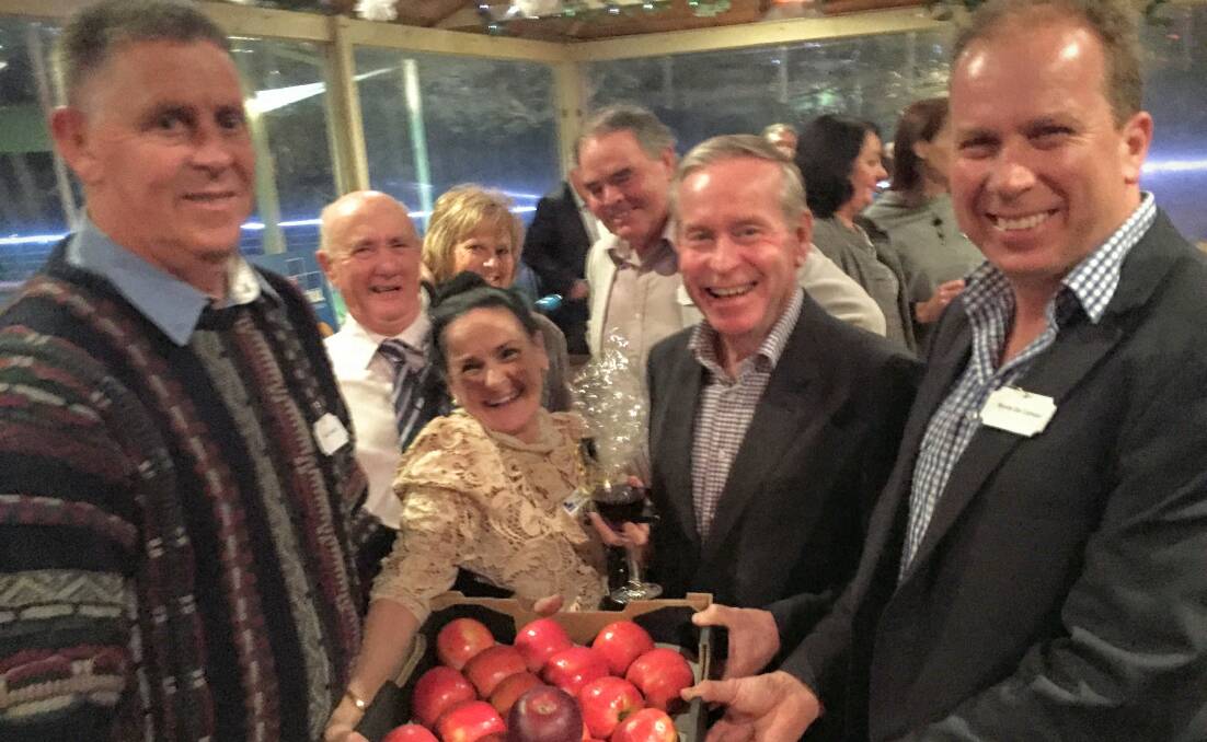 Them apples: Premier Colin Barnett with colleagues and friends at a function in Boyanup on Friday. Politicians of all stripes might want to heed the new survey. Photo: JH