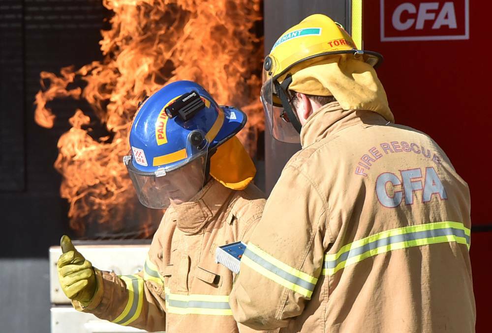 Huntly firefighters train with the mobile unit at the Kangaroo Flat Fire Station. Picture: DARREN HOWE
