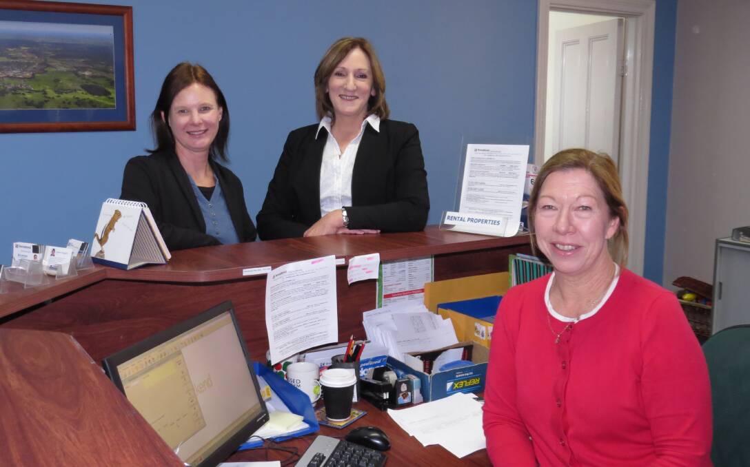 Front of house: Residential property manager Leanne Kavanagh, admin support Peta Fairclough, and receptionist Linda McCabe. Photo: Matt Lau