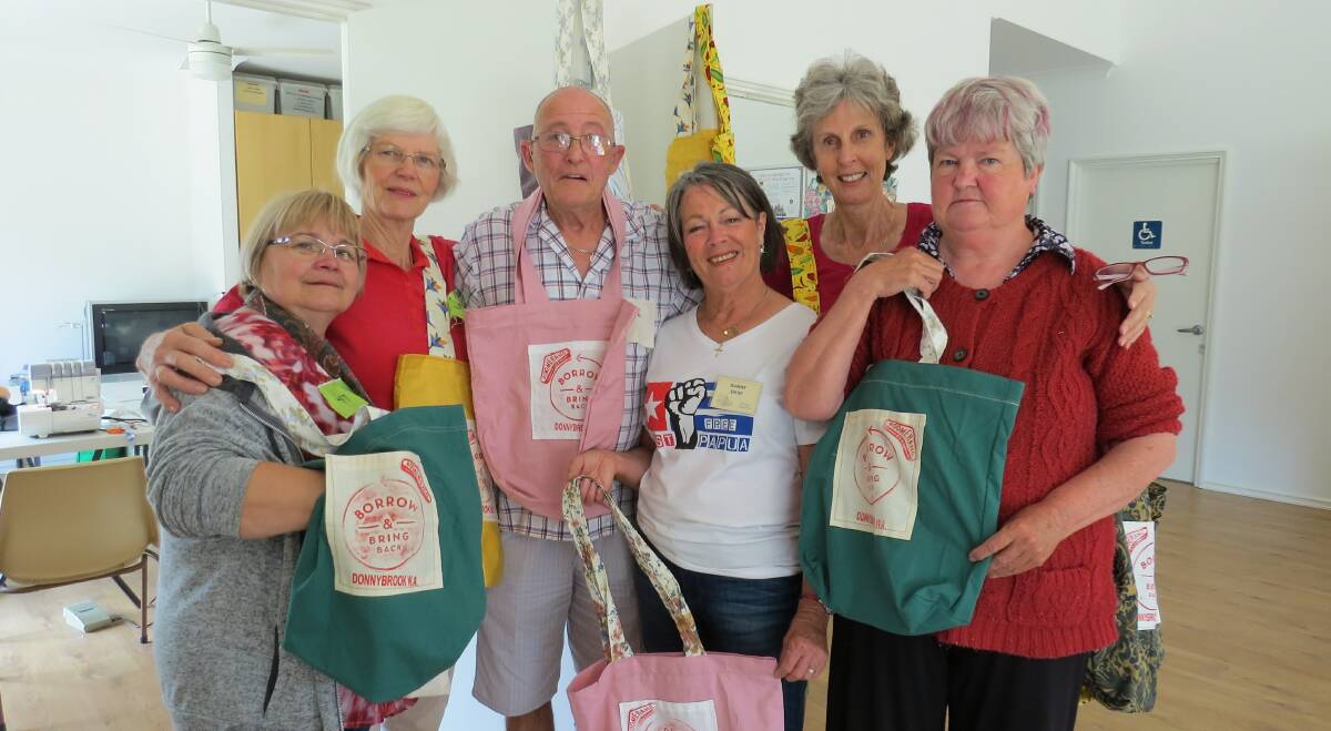 Bag makers: From left to right; Lyn Smith, Lucille Piesse, Will Holdaway, Dianne Da Re, Colleen Bandy, and Deborah Scoullar. Photo: Matthew Lau