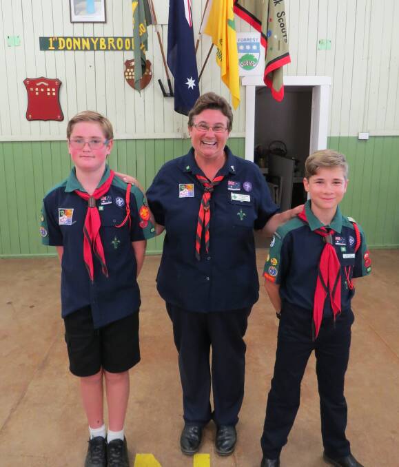 Anticipation: Donnybrook youngsters Seth Bursill (left) and Kade Wallace, with Donnybrook Scout group leader Debbie Bourke, are excited to embark on their first international jamboree experience. Photo: Matthew Lau
