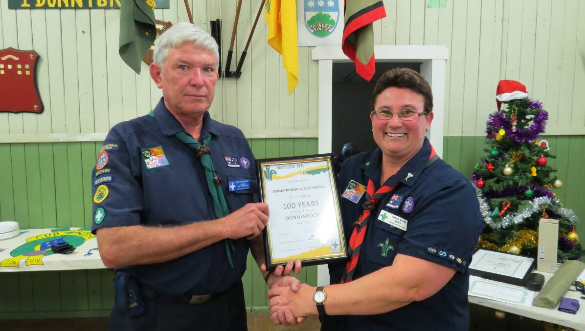 Honour: South West Scouts regional chief commissioner Neil McPherson with Donnybrook Scout group leader Debbie Bourke. Photo: Matthew Lau