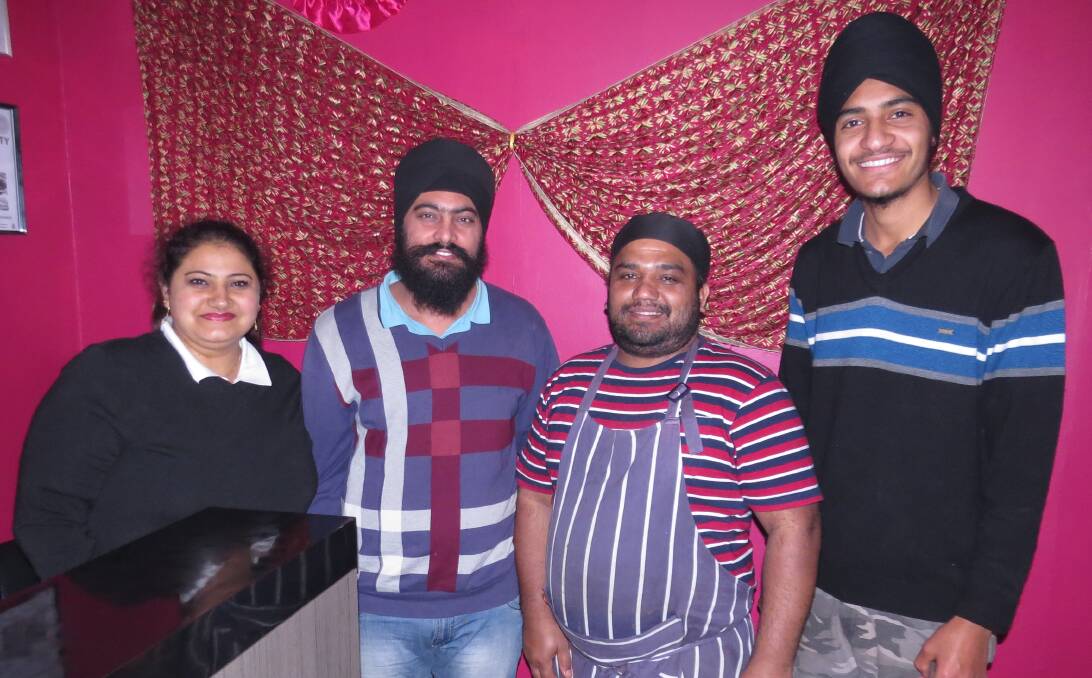 Hospitable: Owners Reet Singh and Ranjodh "Honey" Singh (second from left) with Chef Walia and cousin Pargat Singh at Donnybrook Indian Restaurant in downtown Donnybrook. Photo: Matthew Lau