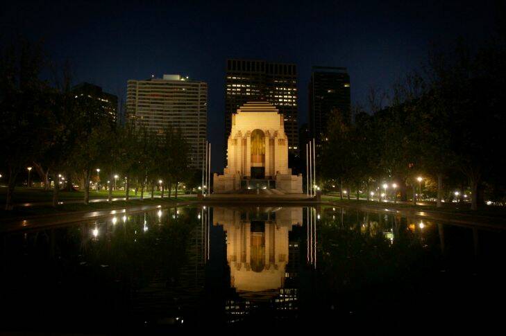 The Hyde Park ANZAC Memorial  casts a mirror image in the pond in the early hours of the morning in Hyde Park. 3rd June, 2011. Sydney, NSW. Photo: Kate Geraghty.