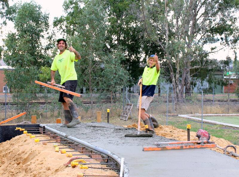 On track: Paul Thomas and Tex Hadley of Convic at work at the site of the Donnybrook skate park. The skate park is due for completion in June.