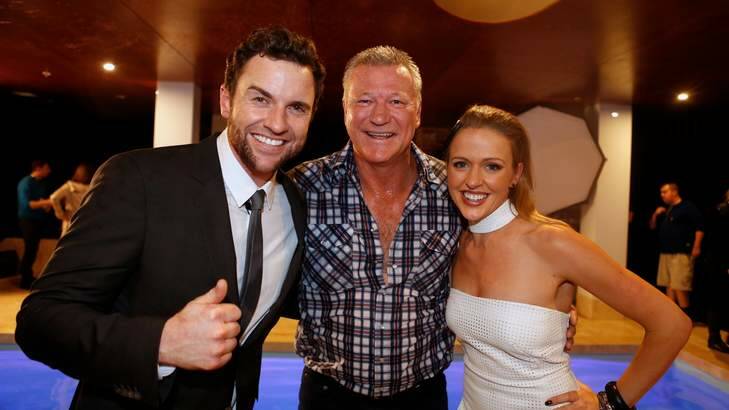 On and on: Steve O'Donnell and Chantelle Ford with Scott Cam at the auctions for Channel Nine's <i>The Block: Fans v Faves</i>. Photo: Eddie Jim