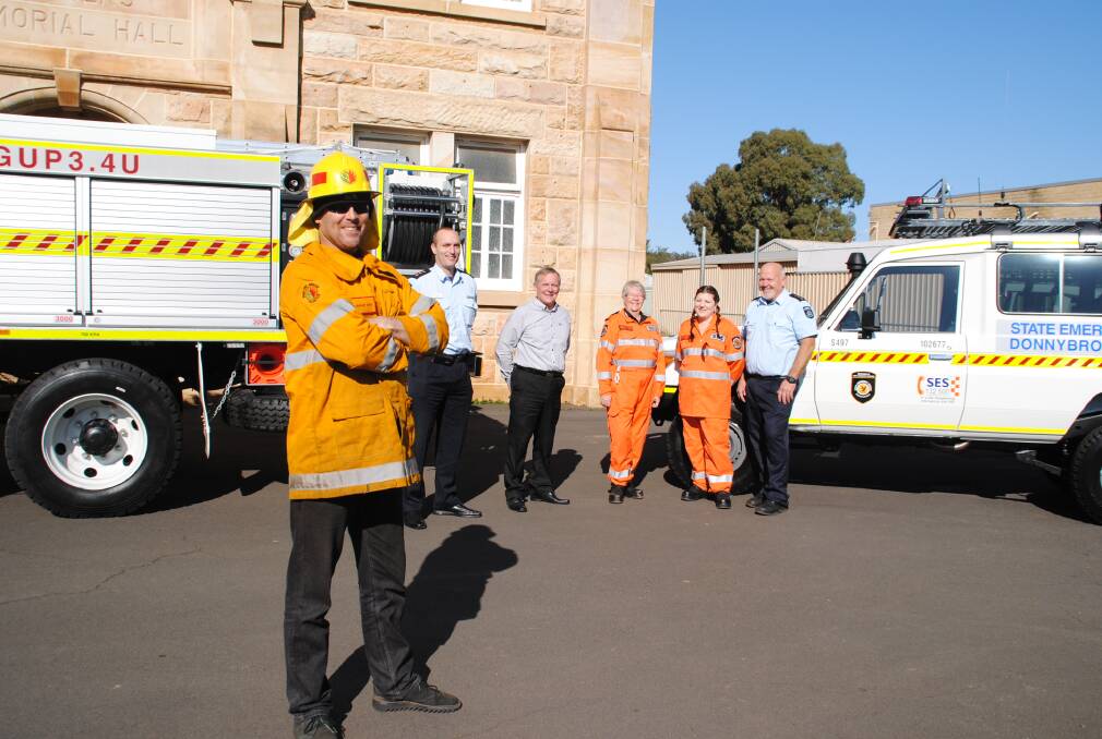 New vehicles: Balingup fire control officer Paul Davis with Department of Fire and Emergency Services'Peter Thomas, shire chief executive John Attwood, Donnybrook SES volunteers Carol Vickridge and Jill Loach and SES acting district officer Wayne Credaro.