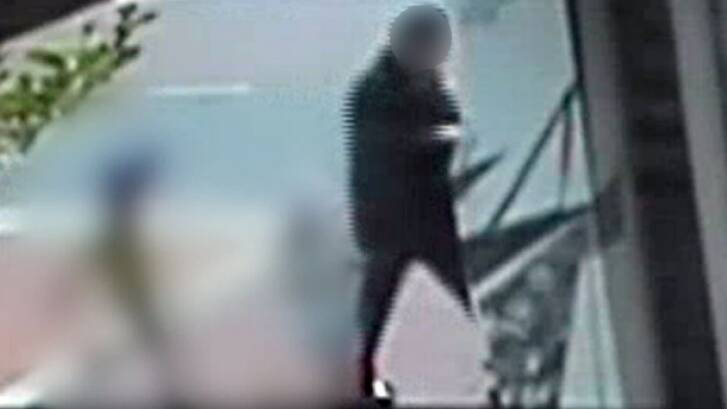 CCTV footage shows the children being led away from the child care centre by a man. 