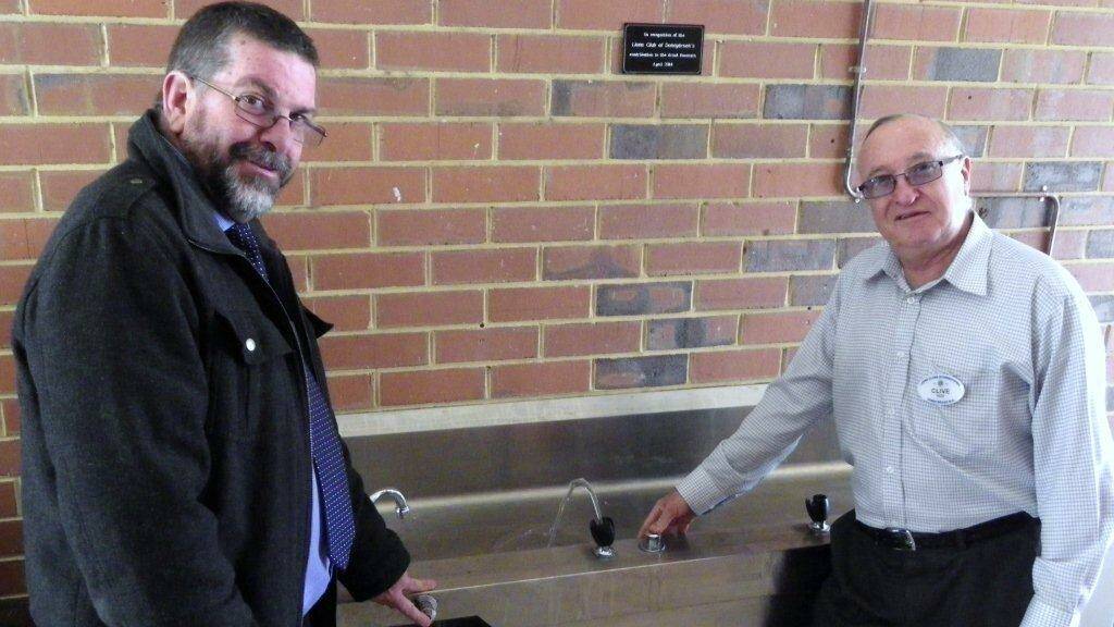 St Mary’s Principal Peter Sell and Donnybrook Lions Club President Clive Reid testing out the various water outlets on the undercover fountain.