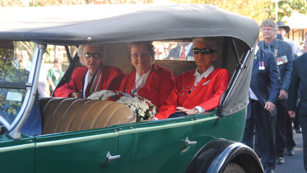 Viv Padman, Dawn Simmons and Betty Foan are driven in the parade.