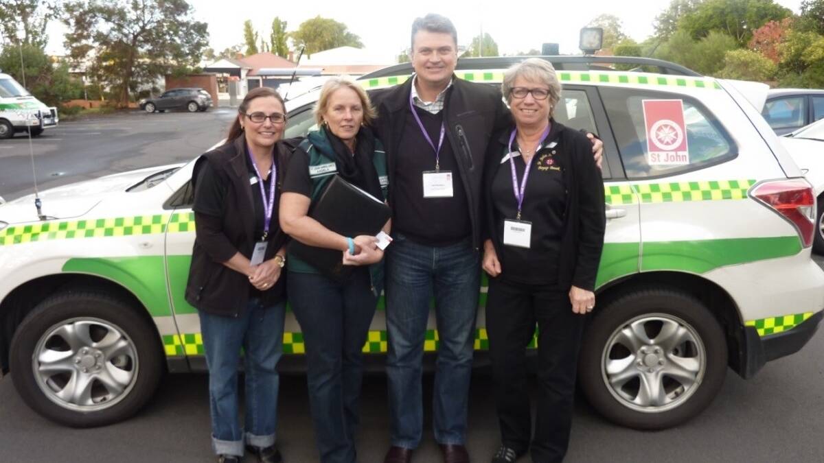 Volunteer ambulance officers Nicki Johns, Angela Hales and Libby Marshall with SW Regional Manager Ian Mumford.