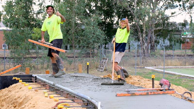 Paul Thomas and Tex Hadley of Convic at work at the site of the Donnybrook Skate Park.