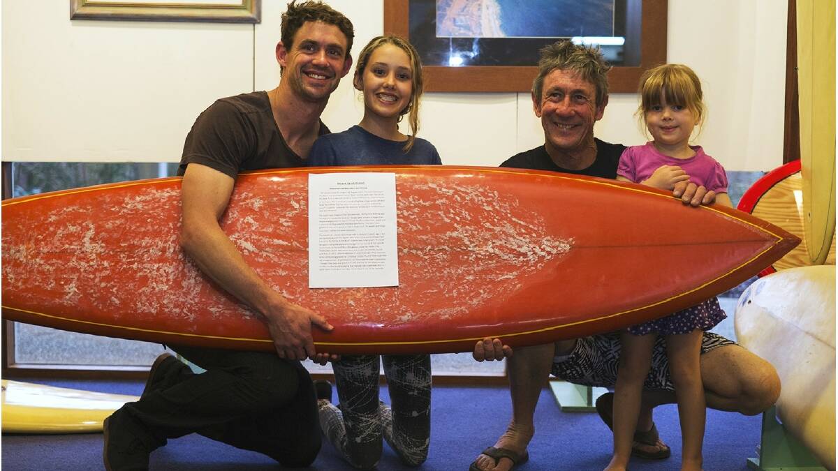 Hamish, Arabelle and Bill Gibson with Rose and a classic Wayne Lynch pintail at the Foam Lust surfboard history exhibition. Photo: Sandy Powell/Augusta-Margaret River Mail.