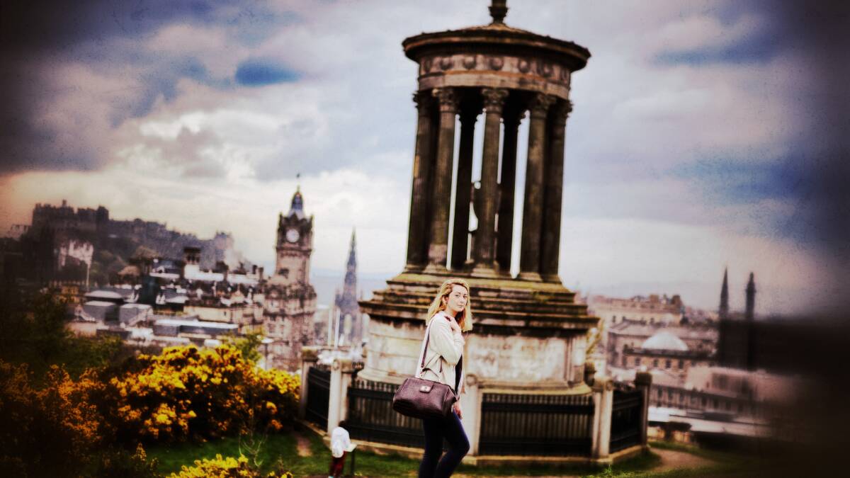 A woman walks past the Dugald Stewart Monument on Calton Hill on April 23, 2014 in Edinburgh, Scotland. Pic: Jeff J Mitchell/Getty Images