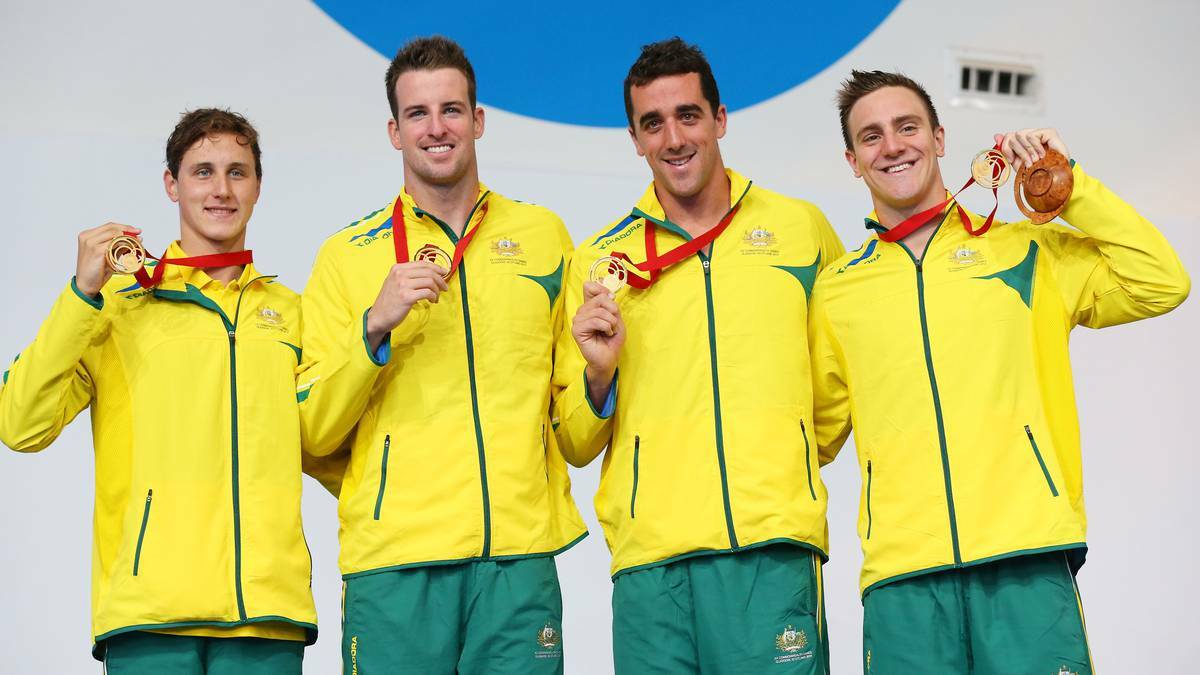Cameron McEvoy, James Magnussen, Matt Abood and Tommaso D'Orsogna of Australia pose with their gold medals during the medal ceremony for the Men's 4 x 100m Freestyle Relay Final. Photo: GETTY IMAGES
