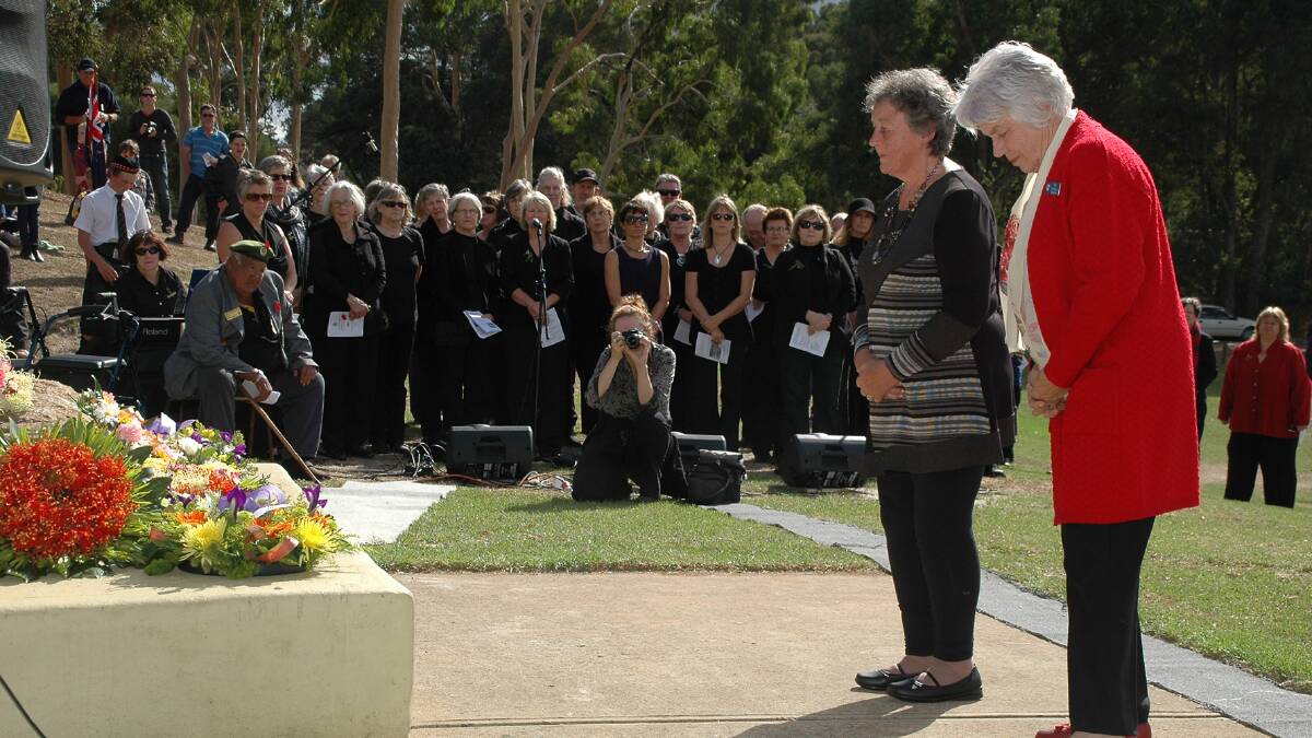 Flowers: Laying the RSL wreathes. Photo: Donnybrook-Bridgetown Mail.