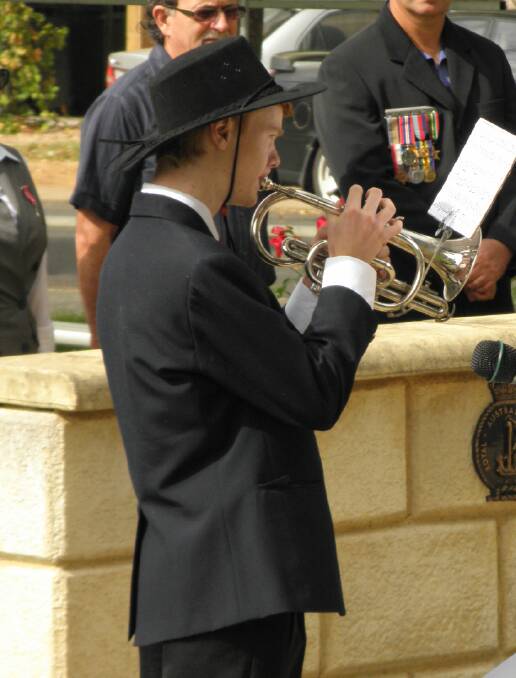 Traditional: Nic Stokes sounding out the Last Post. Photo: Donnybrook-Bridgetown Mail.