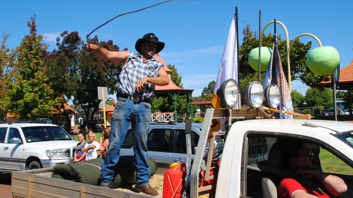 Leigh Everett has a cracking good time in the parade in 2013.