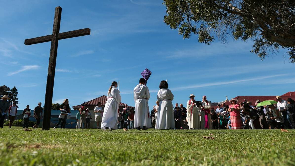 WOOLONGONG: Bishop Peter Ingham leads the service of the Stations of the Cross at Saint Francis Xaviers. Photo: Adam McLean/Illawarra Mercury.