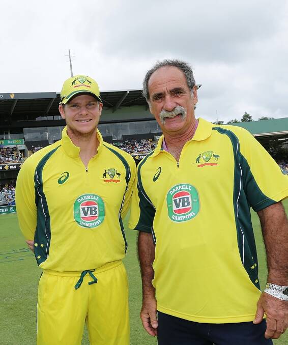On the field: Australian Cricket Captain Steve Smith with Donnybrook volunteer Darrell Ramponi. Photo: Will Russell - CA/Cricket Australia/Getty Images