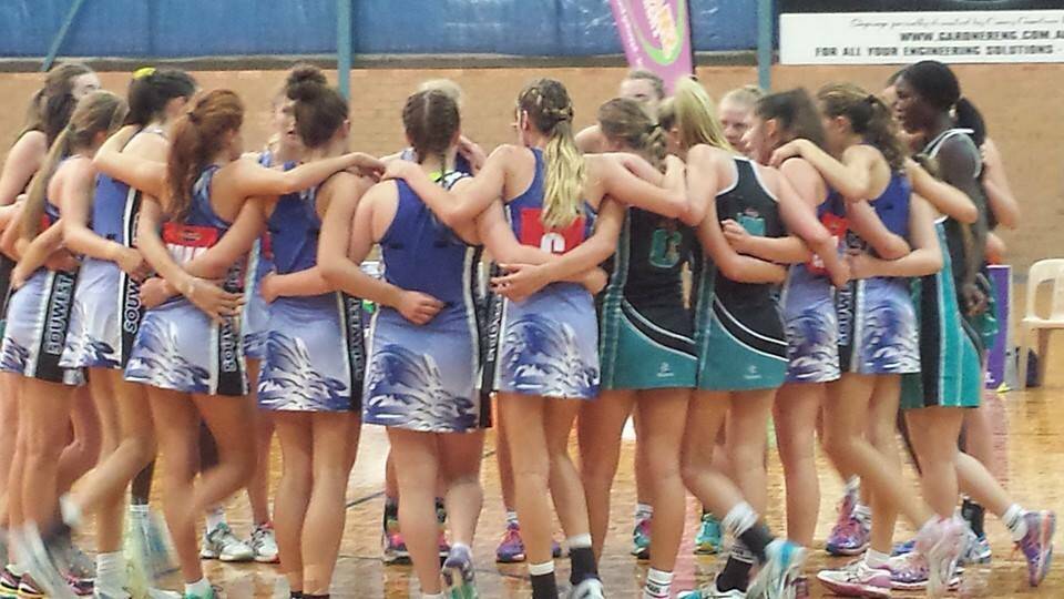 The Souwest Jets rally together at the end of a game in Bunbury. 