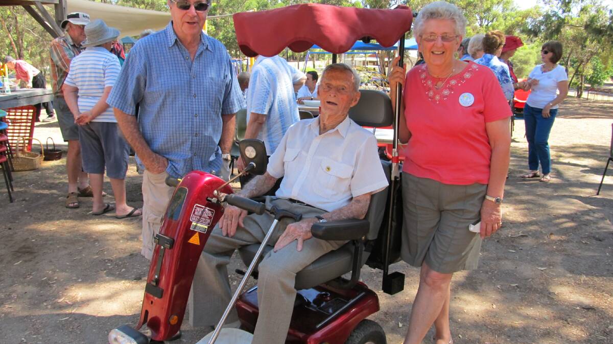 Richard Trigwell on his gopher with friends Chris Glynn and Shirley Broadhurst at the 2012 Australia Day in Boyup Brook. 