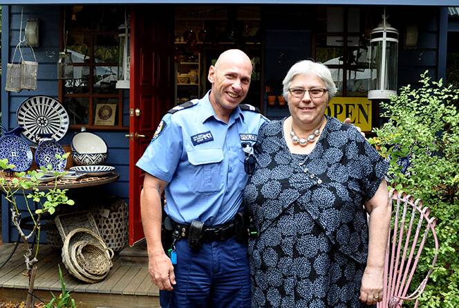 Local business woman Jenny Rotman thanks Senior Constable Mike Smith for his fine police work. 