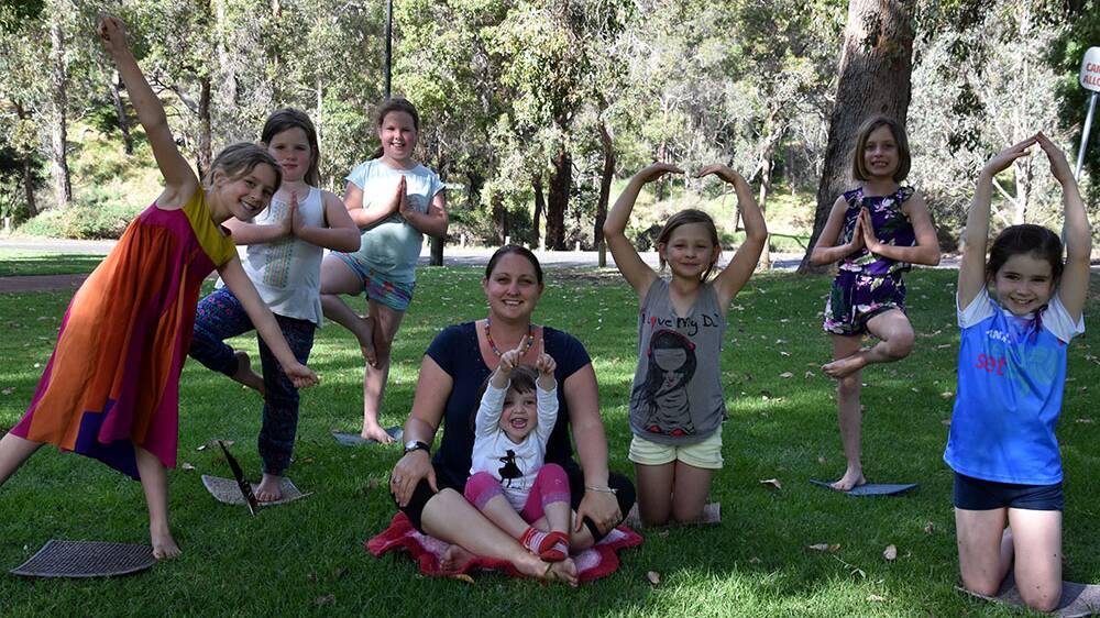 Yoga for kids: Sofia Rand, Ruby Rand, Ella Royce, Maggie Royce, Sienna Christie, Abby Marshall, Penny Marshall and instructor Nicole Marshall. Photo: Lee Steinbacher