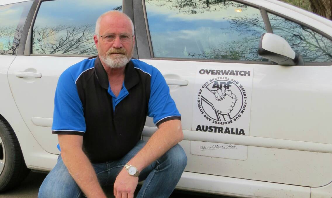 Suicide preventer: Overwatch Australia national coordinator Marc Kirwan is leading the volunteer-based organisation, which responds to alarming social media posts made by former service people. Photo: Matthew Lau