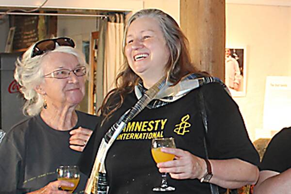 Marta Sandberg with Noela Horsley  attending an Amnesty event at the Bridgetown Pottery Gallery.