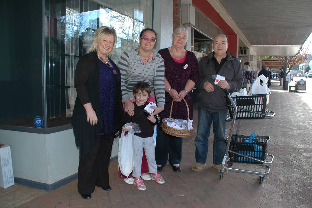 Help at hand: Youth worker Carol Stokes, Elaine Johansen and her son Quailin, co-ordinator Sue Truell and Laurie Minon.
