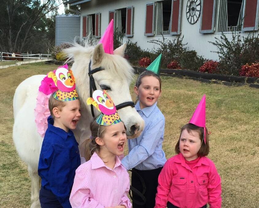 KIDS JOIN IN: At Heritage Hill, Moonbi, NSW the kids love to join in the birthday celebrations for their four-legged equine friends.