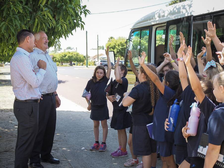 New wheels: Member for Collie-Preston Mick Murray meets students to celebrate their new school bus, delivered as an election commitment. Photo: Supplied.