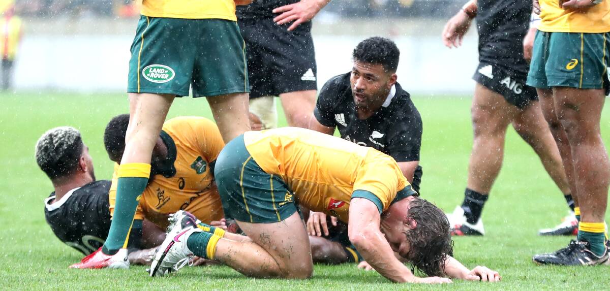 The Wallabies and All Blacks gave it everything for 89 minutes and could not be split. Picture: Getty