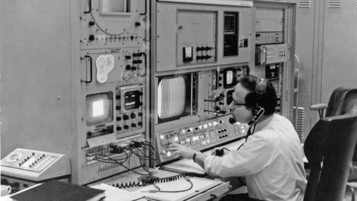 Ed Von Renouard sits at the video console at the Honeysuckle Creek Tracking Station. Picture: Hamish Lindsay and Colin Mackellar.