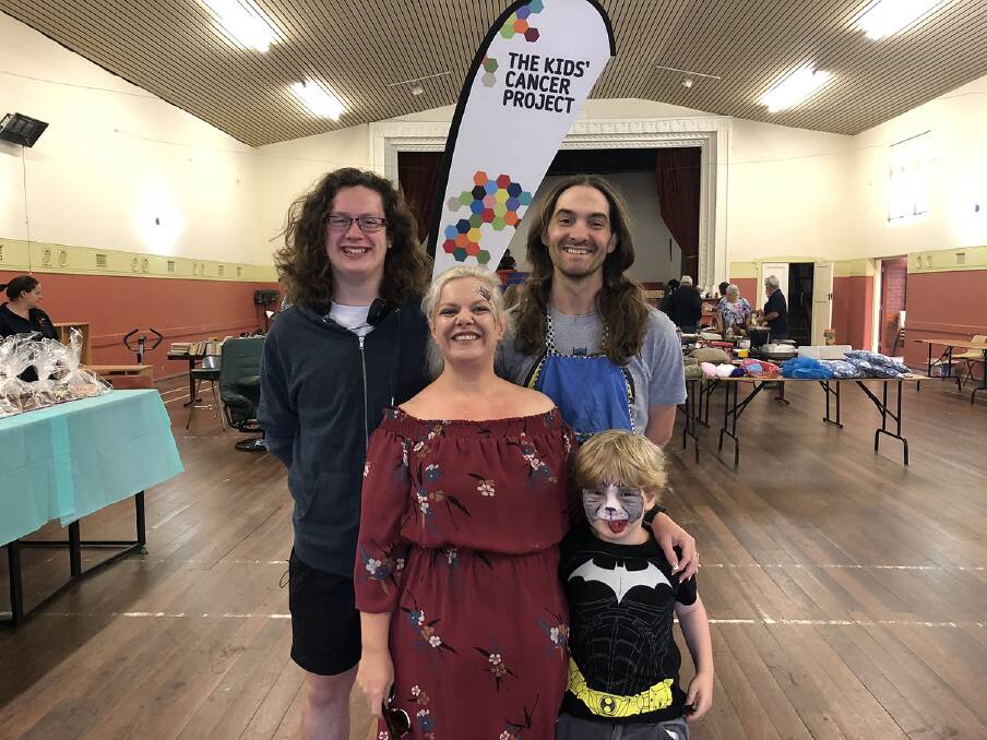 Super family: Kyle, Samantha and Corbin Baker - along with Tristan Loton - are preparing to have their hair shaved or coloured for a noble cause.