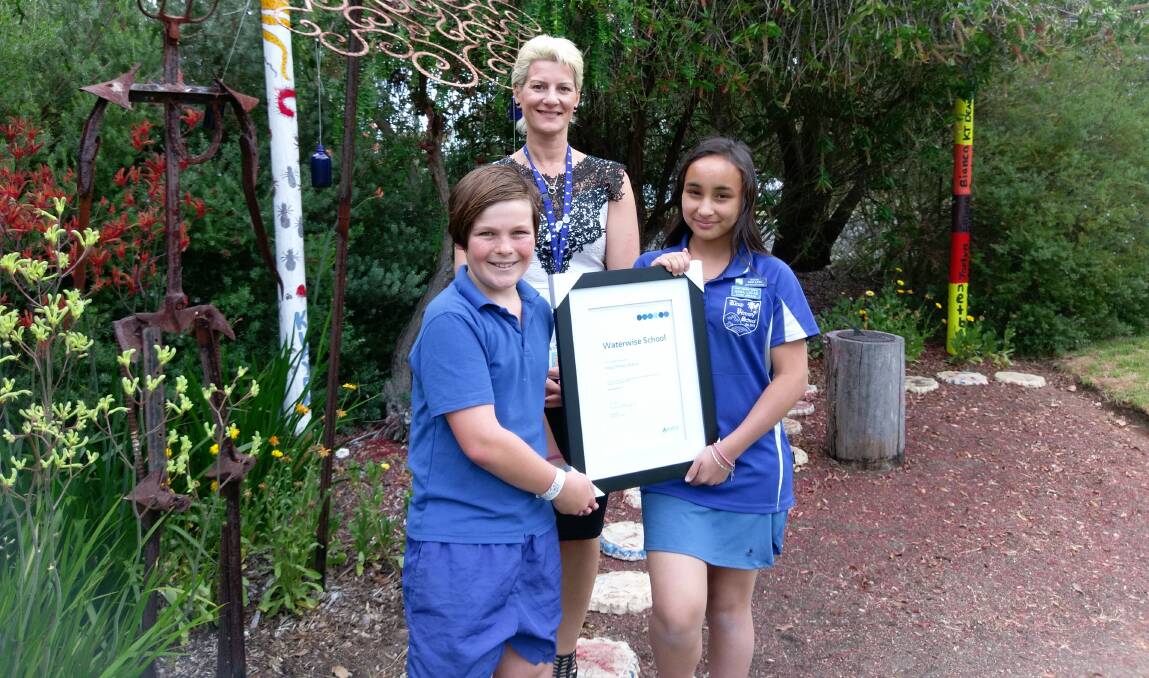 Water focus: Kirup Primary School students Ruben Law and Anna Lucas with Water Corporation South West Regional Manager Nicky Waite. Photo: Supplied. 