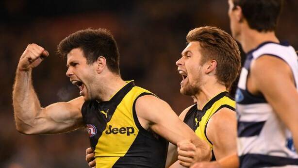 Skipper Trent Cotchin had a huge influence on a big night for the Tigers. Photo: AAP