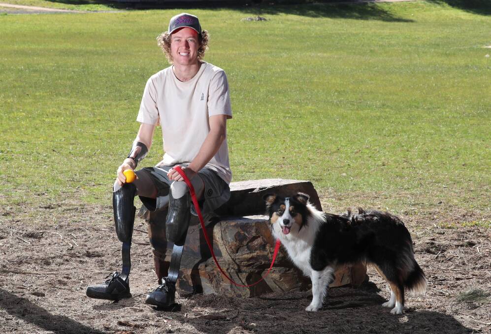 LOOKING AHEAD: Josh Hanlon at the park with Lulu on Thursday. He'll turn 22 this week, just before Lulu turns one. It's been some year. Picture: Les Smith