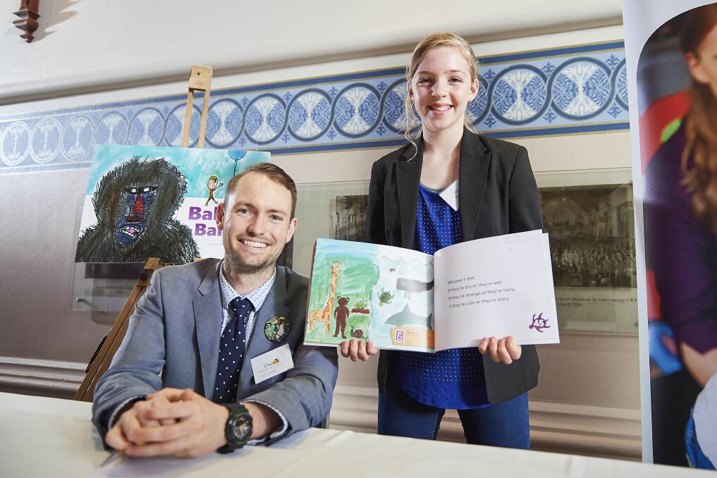 Tessa Boswell and author Sean Avery with her winning illustration. Photo: supplied