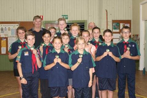 History on show: Donnybrook RSL President Ric Evans and John Box presented the Donnybrook Scouts with their badges. 

