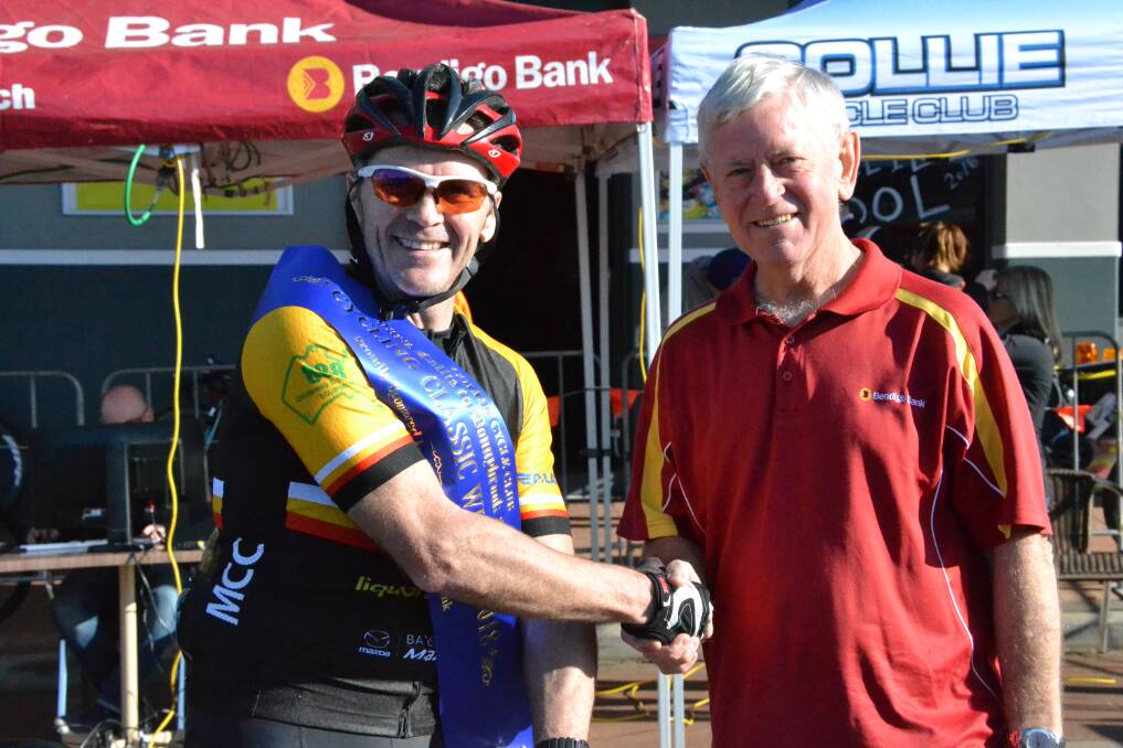 Shire of Collie deputy president Ian Miffling congratulated Collie to Donnybrook and Return Cycling Classic winner Rob Dreghorn. Photo: Breeanna Tirant 