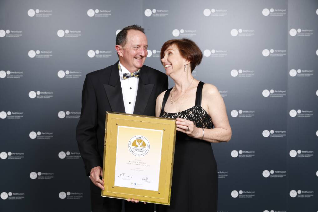 WINNERS: Balingup Heights Hilltop Forest Cottages owners Deb and Brian Vanallen were thrilled to be awarded gold in the 2018 Perth Airport Western Australia Tourism Awards. Photo: supplied. 