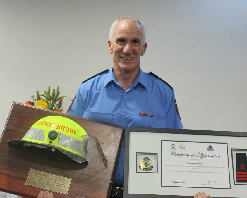 Russell Jones was one of six recently awarded for his volunteer work with the Donnybrook fire service. The photo is from 2016 when he stood down as captain.