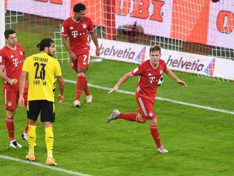 A late goal from Joshua Kimmich secured Bayern Munich a 3-2 Super Cup win over Borussia Dortmund.