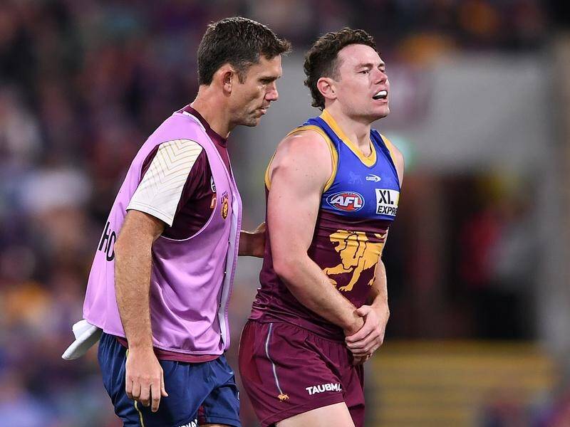 Brisbane Lions ace Lachie Neale has left training early with what appears to be a shoulder issue.