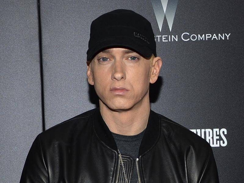 Rapper Eminem has released a surprise new album, Kamikaze, after announcing it on Twitter.