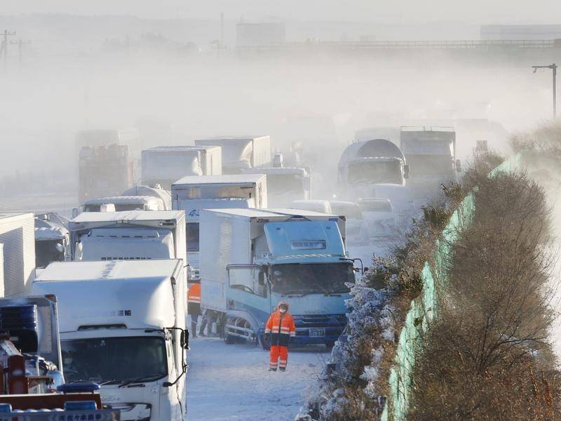 Cars were stuck on the snowy Tohoku Expressway in northern Japan after a multiple car accident.